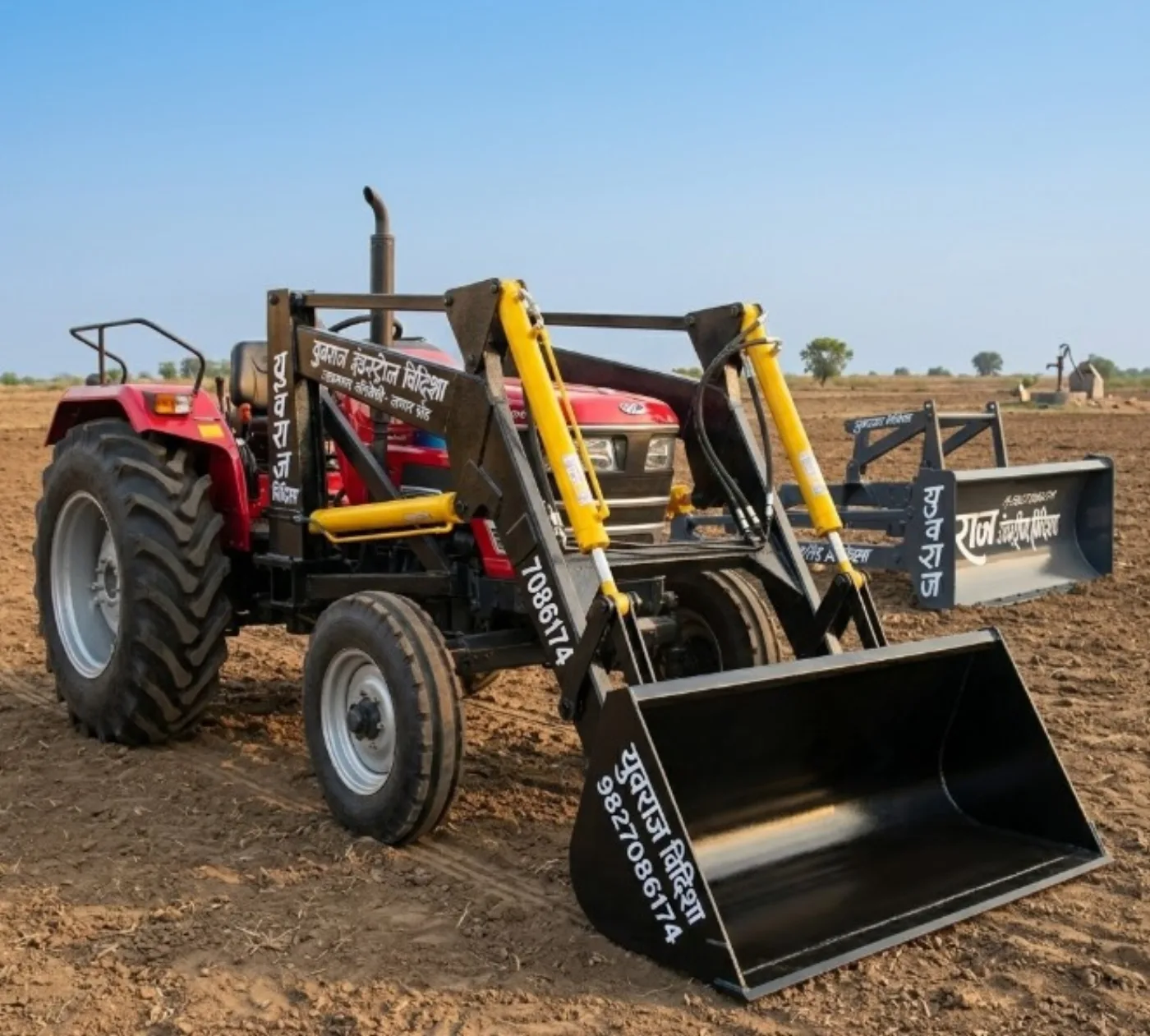 Yuvraj Industries tractor front loader in a field