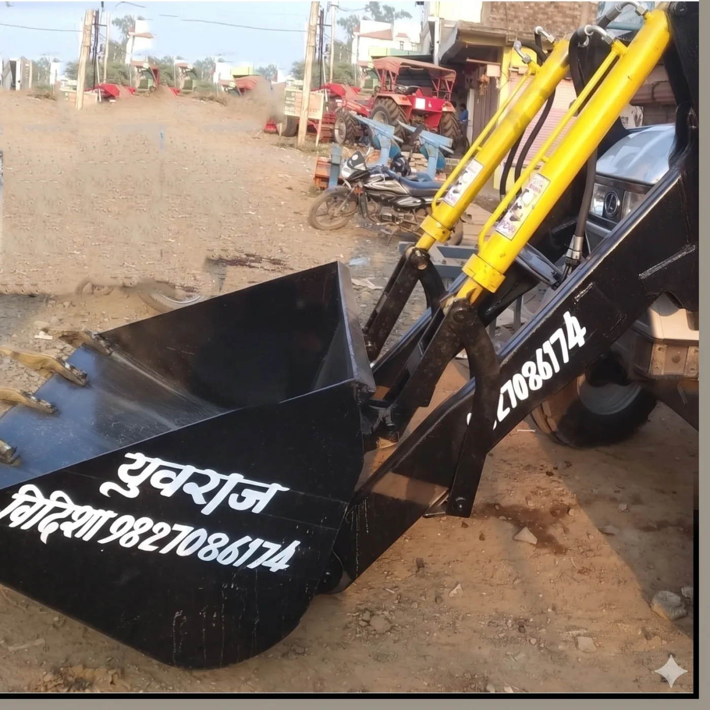 Yuvraj Industries front loader bucket during work